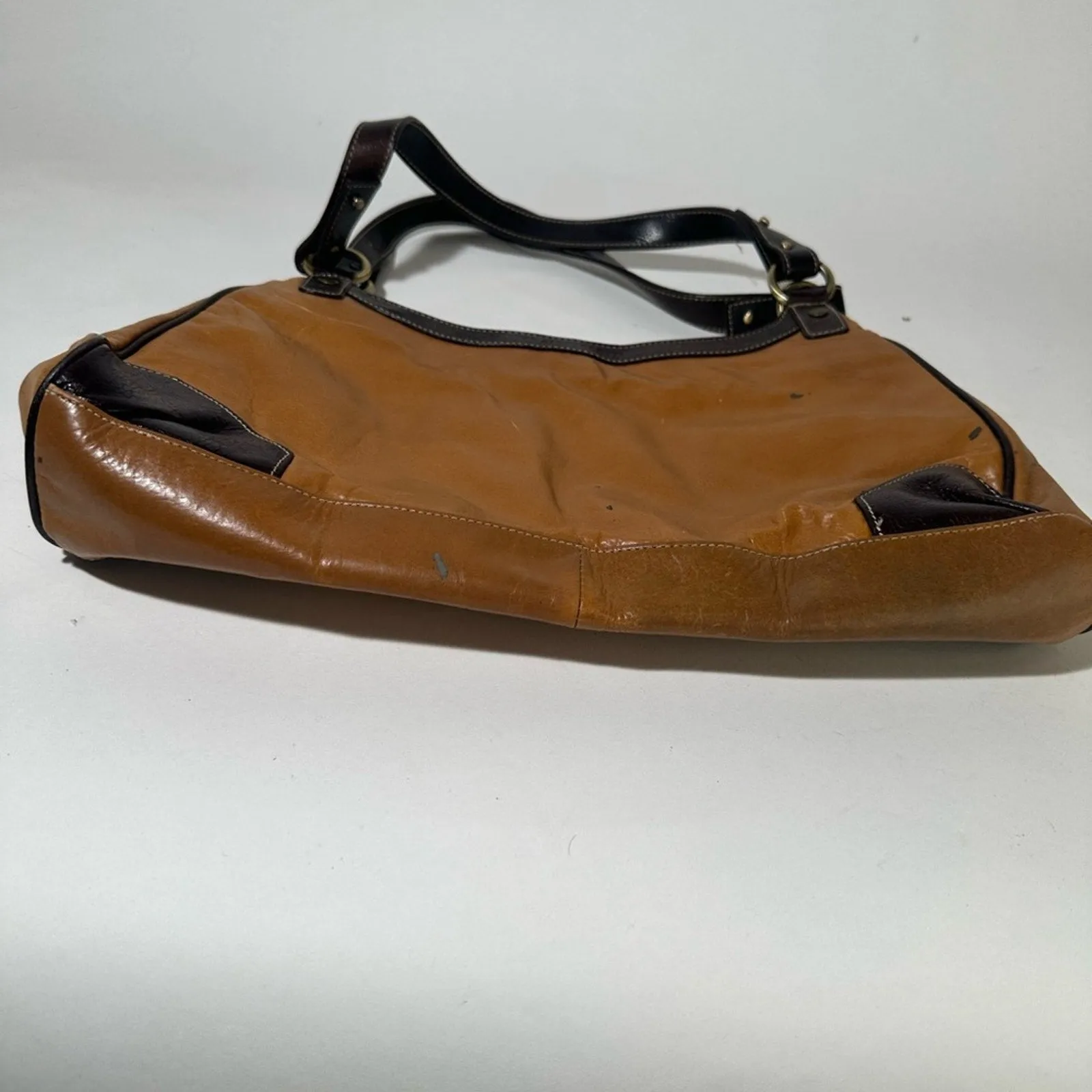 Elegant Brown and Black Leather Shoulder Bag with Adjustable Strap