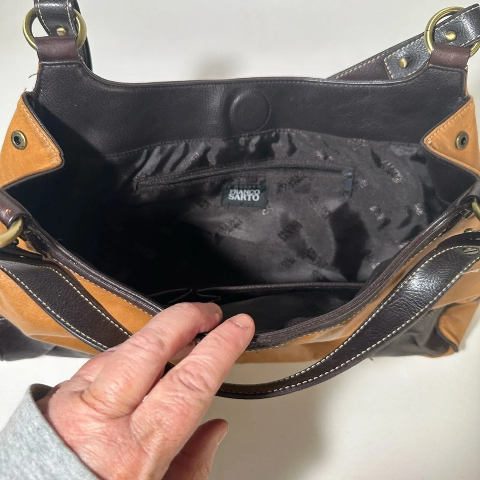 Elegant Brown and Black Leather Shoulder Bag with Adjustable Strap