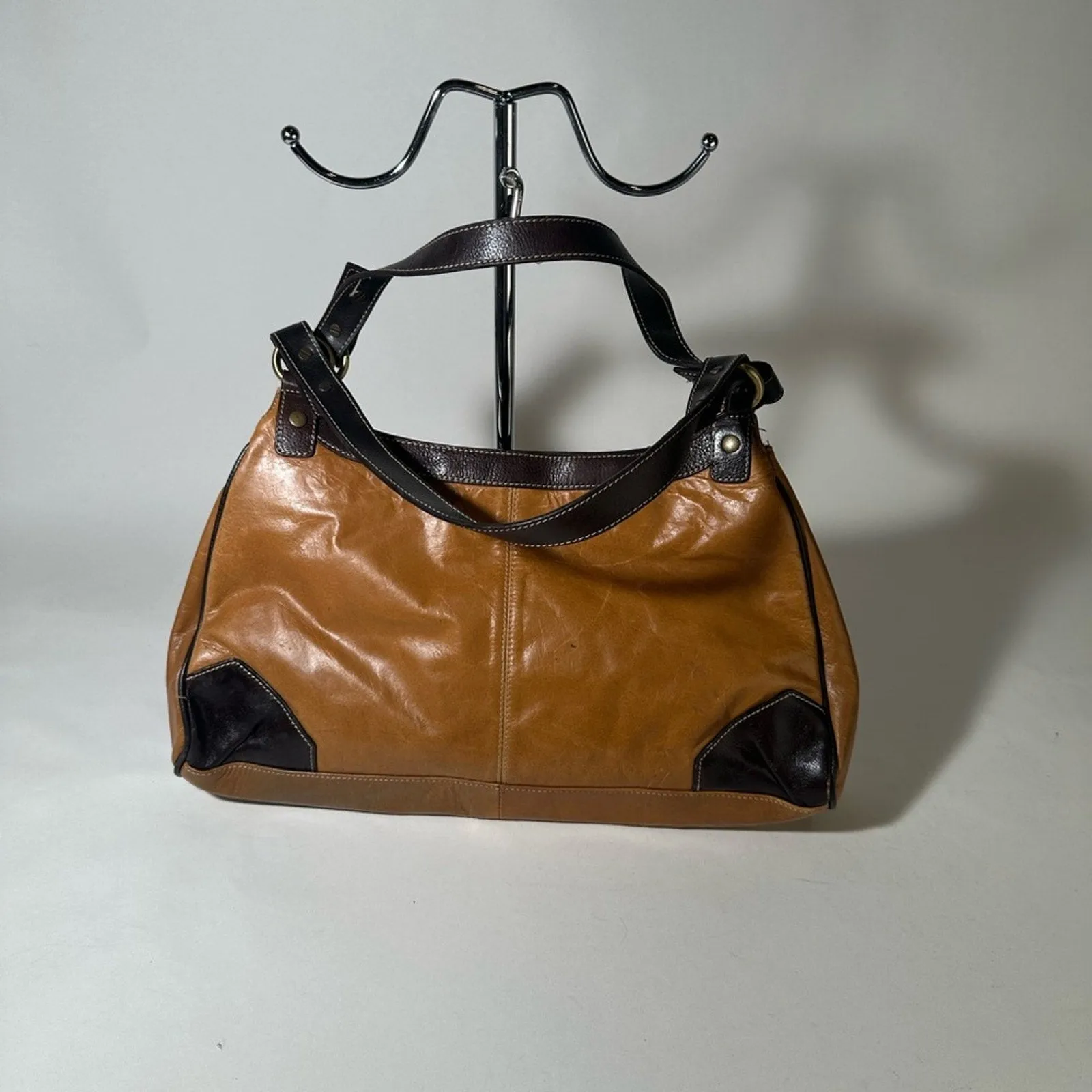 Elegant Brown and Black Leather Shoulder Bag with Adjustable Strap